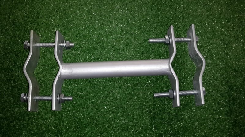 Custom-fabricated steel mast bracket made by Omnicon.